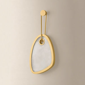 Vela Wall Sconce shown from a second angle to highlight the arm curve and shade silhouette.