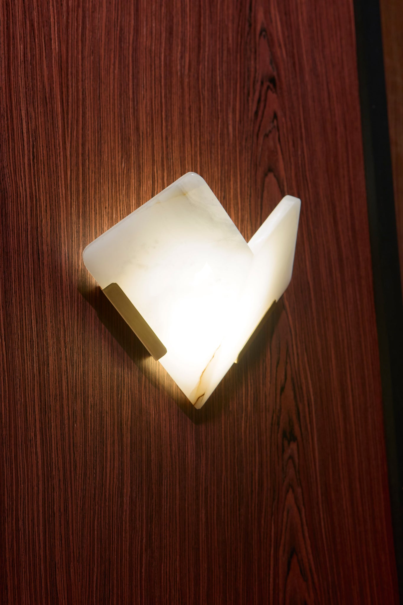 Geo Wall Sconce 13.25" styled in a curated living room for warm, layered light at Laurie Yapp Home.