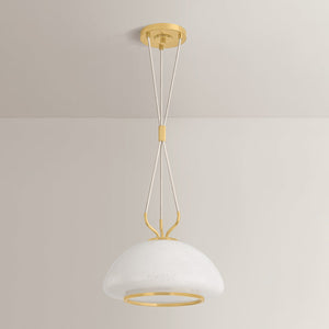 Baudette Pendant 14.25" in aged brass shown from a second angle to highlight the shade shape and metal detail.
