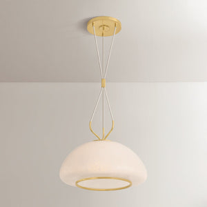 Close-up of the Baudette Pendant 18" in aged brass showing the shade shape and metal detail.