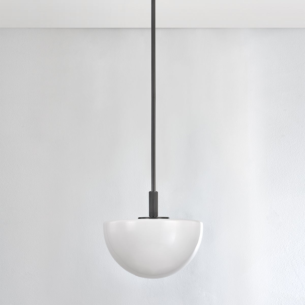 Close-up of the Lethbridge Pendant 15" in bronze showing the shade shape and metal detail.