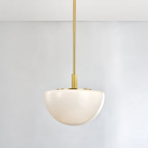 Close-up of the Lethbridge Pendant 19" in aged brass showing the shade shape and metal detail.
