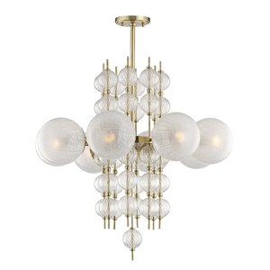 Calypso Chandelier 33.5" in aged brass — a Hudson Valley chandelier for dining rooms, entries, and living rooms at Laurie Yapp Home.