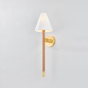 Close-up of the Watkins Wall Sconce in aged brass showing the arm curve and shade silhouette.