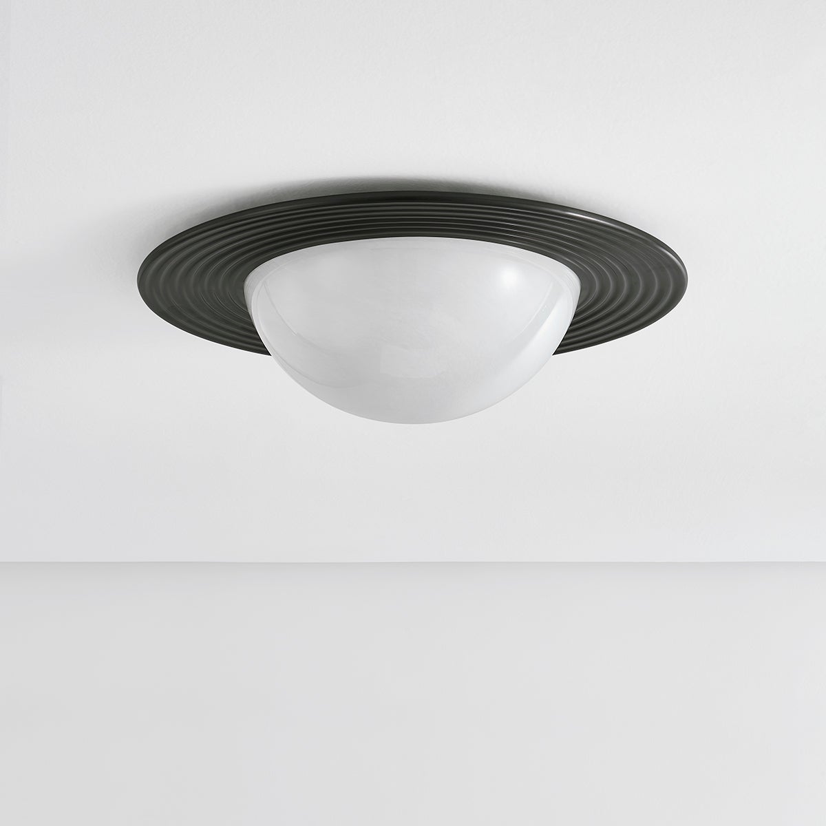 Close-up of the Geraldton Flush Mount 21" in dark bronze showing the shade profile and mounting canopy.