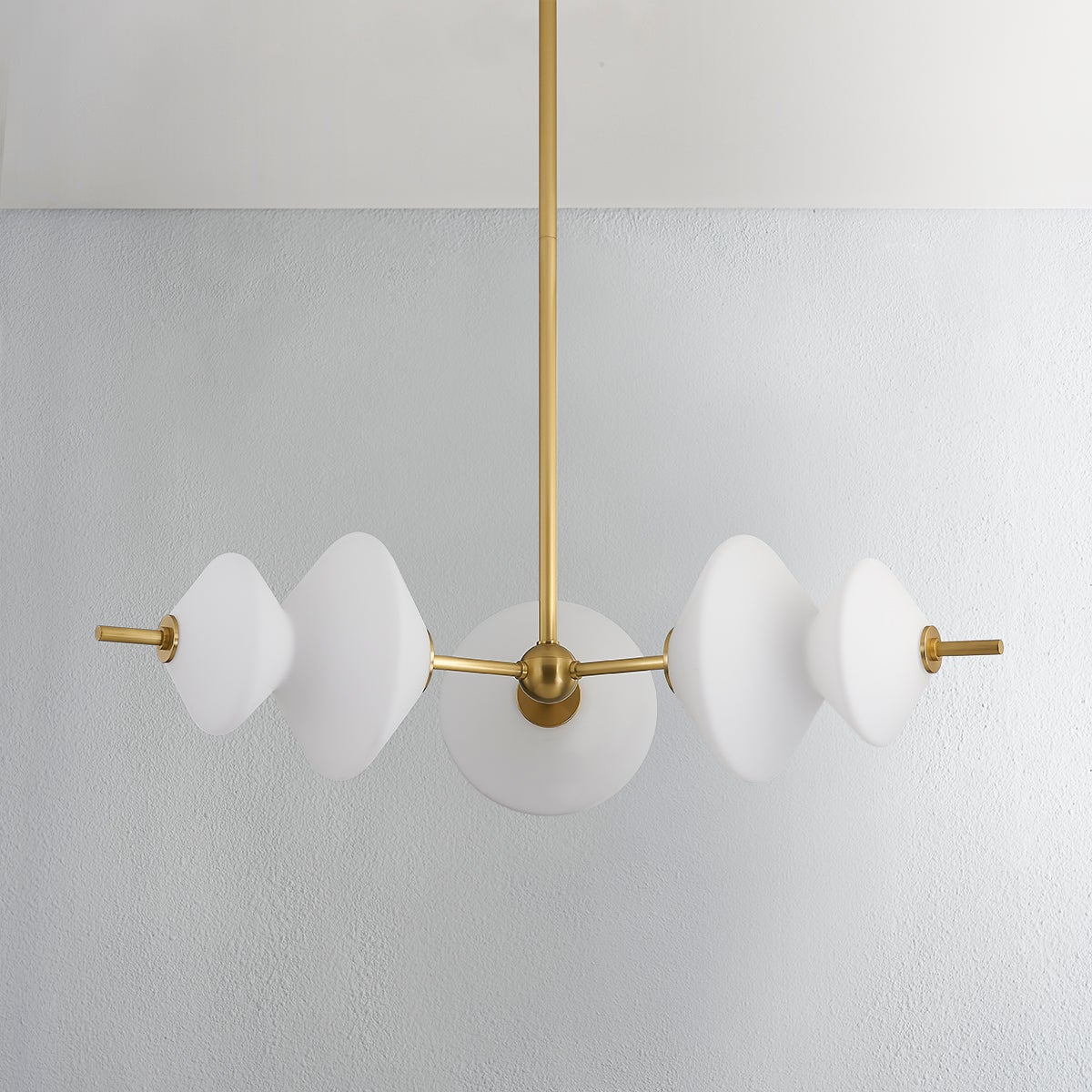 Barrow Chandelier in aged brass shown from a second angle to highlight the frame, arms, and shade detail.