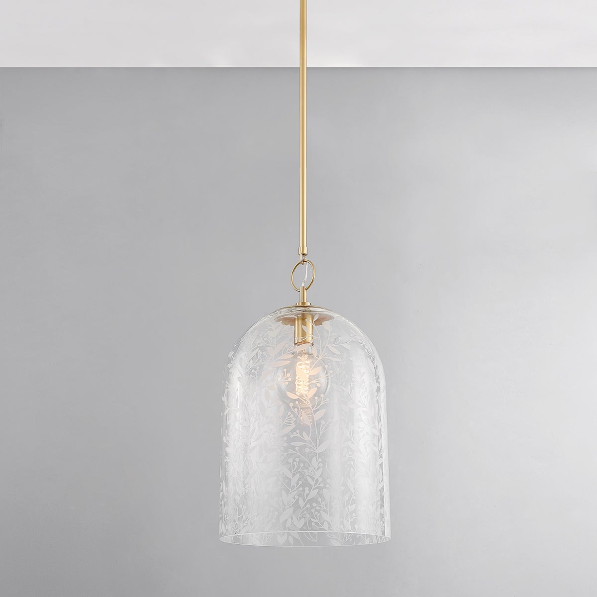 Close-up of the Belleville Pendant 14" in aged brass showing the shade shape and metal detail.