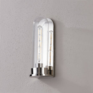 Close-up of the Irwin Wall Sconce in polished nickel showing the arm curve and shade silhouette.