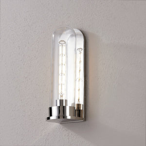 Close-up of the Irwin Wall Sconce in polished nickel showing the arm curve and shade silhouette.