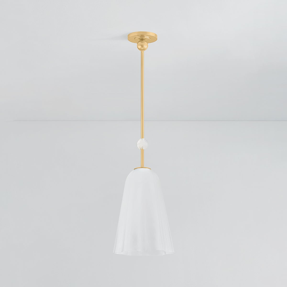Cambria Heights Pendant in aged brass shown from a second angle to highlight the shade shape and metal detail.