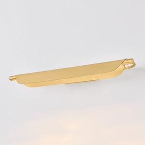 Tinwald Picture Light 27" in aged brass shown from the front to reveal the arm curve and shade proportion.