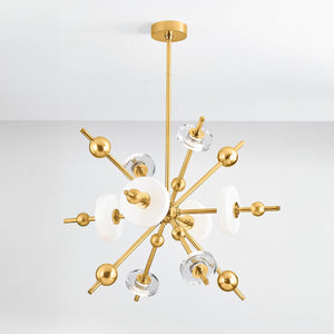 Close-up of the Maynard Chandelier 32" in aged brass showing the frame, arms, and shade detail.