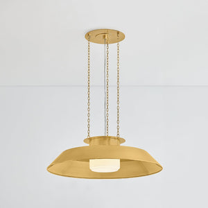 Close-up of the Woodrow Pendant 32" in aged brass showing the shade shape and metal detail.