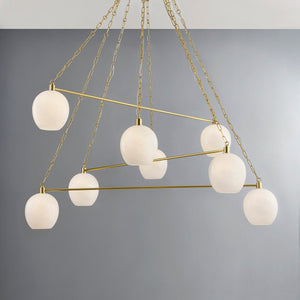 Asbury Park Chandelier 54.5" in aged brass shown from the front to reveal the frame, arms, and shade detail.
