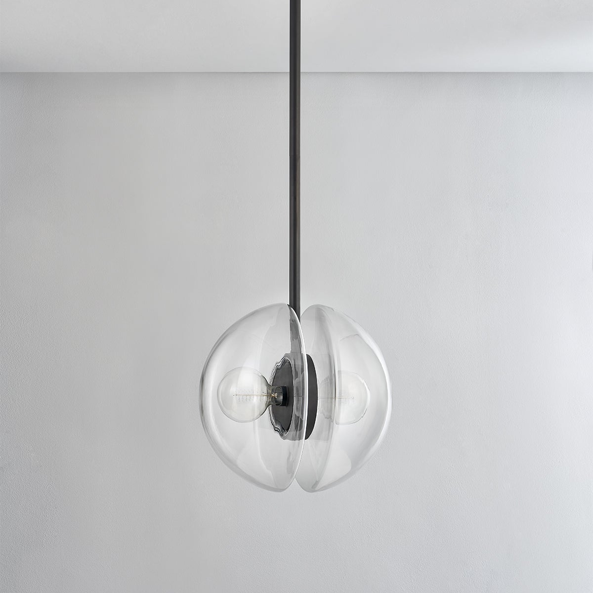 Close-up of the Kert Pendant 17" showing the shade shape and metal detail.
