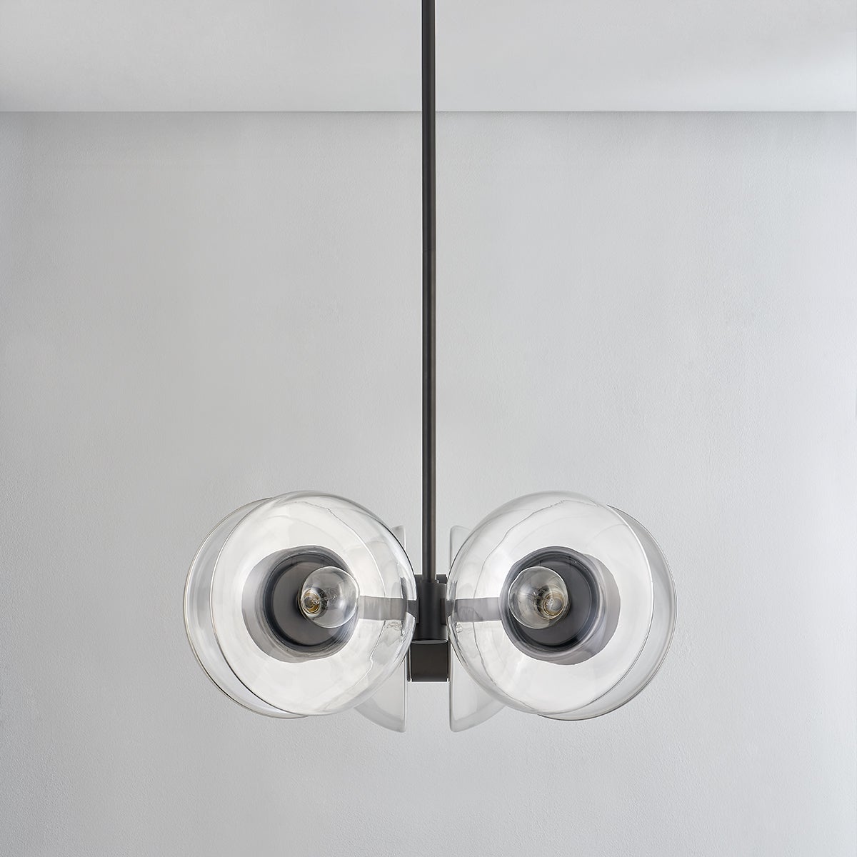 Close-up of the Kert Chandelier 27" showing the frame, arms, and shade detail.