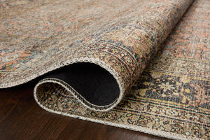 Adrian Terracotta / Multi styled underfoot in a layered living room at Laurie Yapp Home.