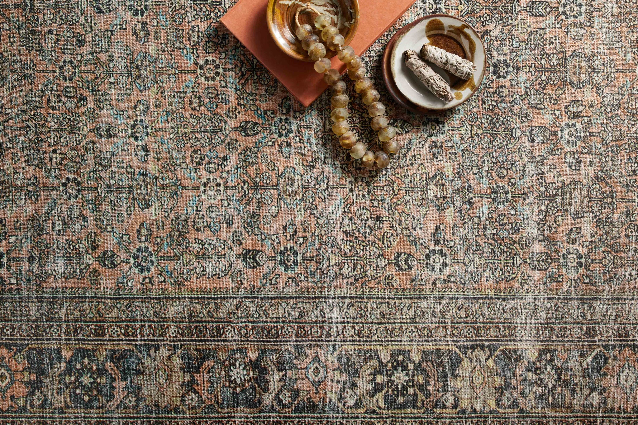 Side view of the Adrian Terracotta / Multi rug.