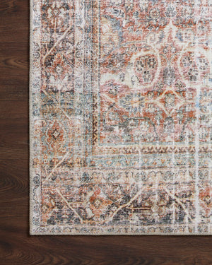 Adrian Sunset / Charcoal shown in a curated living room setting at Laurie Yapp Home.