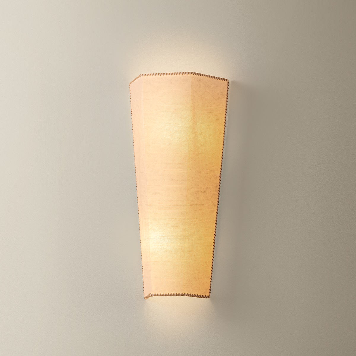 Celmins Wall Sconce 7.5" shown from a second angle to highlight the arm curve and shade silhouette.