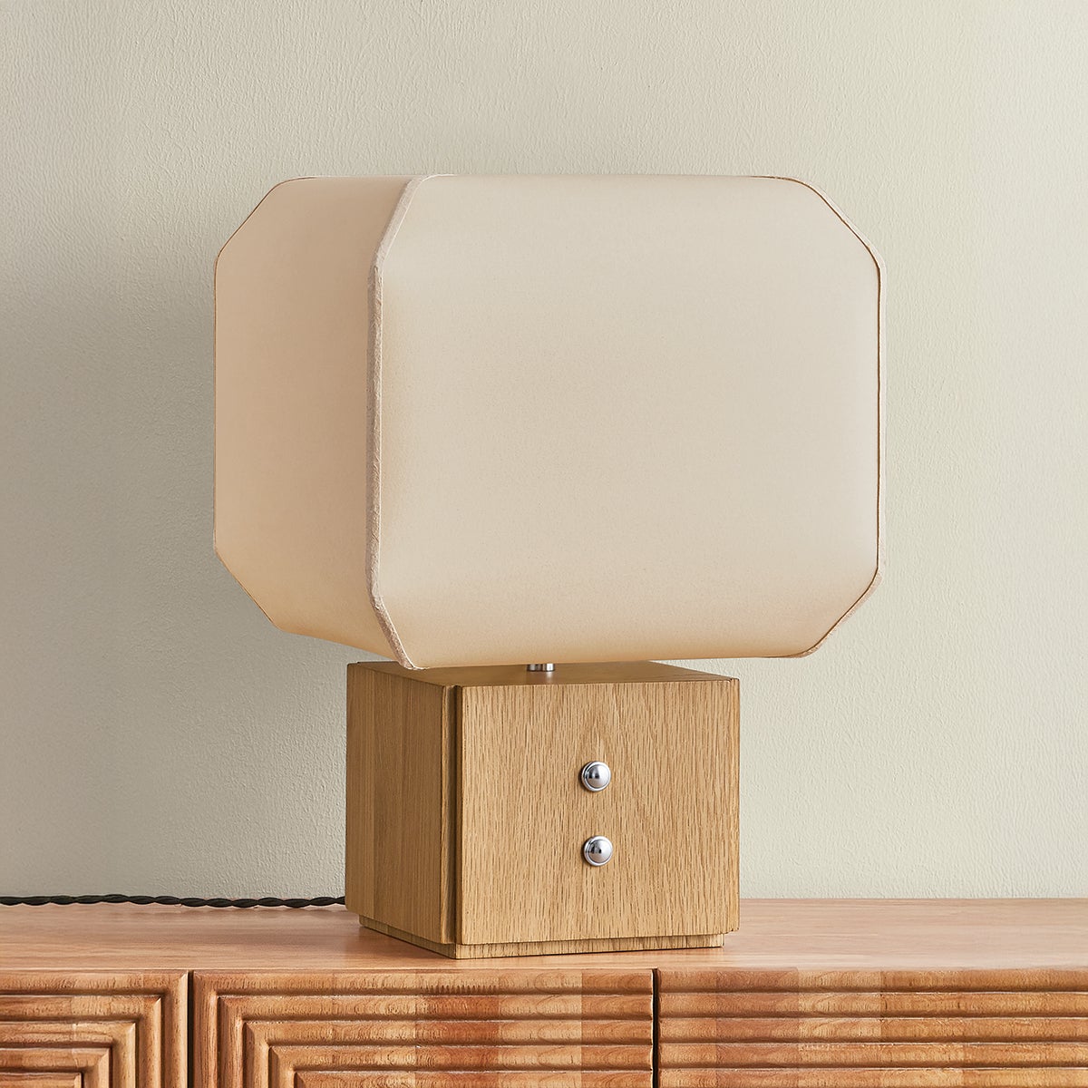 Brice Table Lamp in polished nickel shown from a second angle to highlight the base and shade proportions.