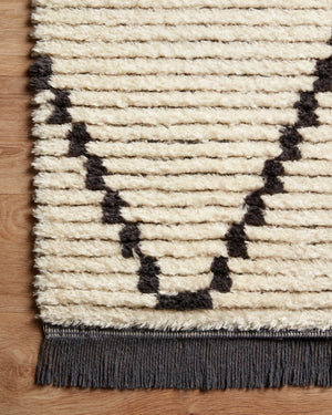 Alice Cream / Charcoal by Chris Loves Julia x Loloi (Pattern 4) shown in a curated living room setting at Laurie Yapp Home.