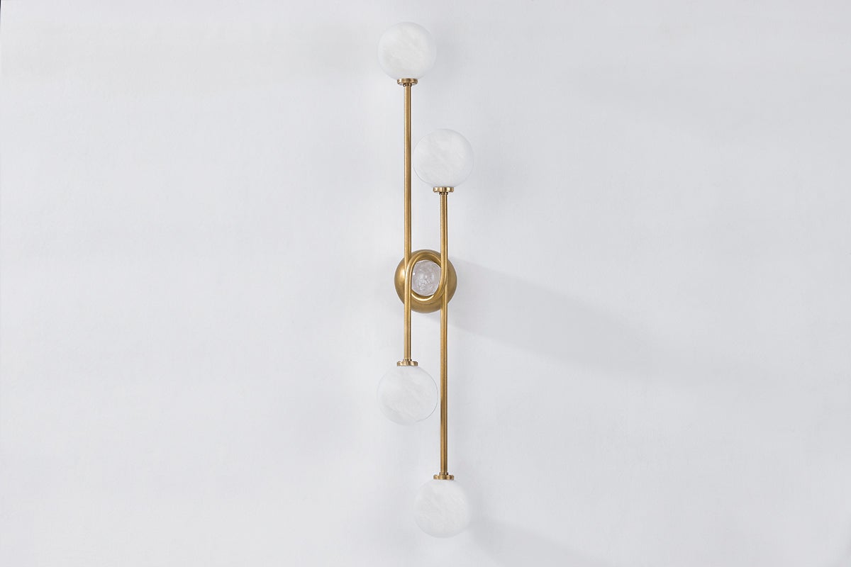 Astro Wall Sconce shown from a second angle to highlight the arm curve and shade silhouette.