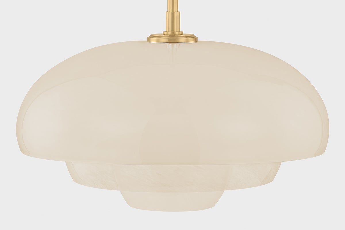 Close-up of the Auburndale Pendant in aged brass showing the shade shape and metal detail.