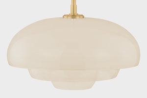 Close-up of the Auburndale Pendant in aged brass showing the shade shape and metal detail.