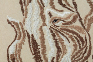 Tisk Tusk Beige / Ivory shown from a different angle to reveal its pattern.