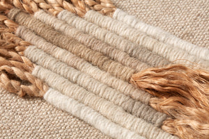 Michelle Beige / Ivory Rug Art shown from a different angle to reveal its pattern.