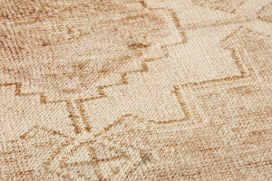 Florence Ivory / Beige Rug Art shown from a different angle to reveal its pattern.