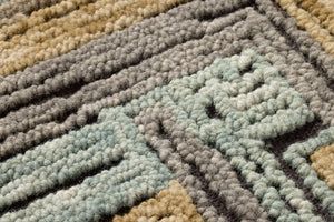 Bisect Blue / Gold Rug Art shown from a different angle to reveal its pattern.