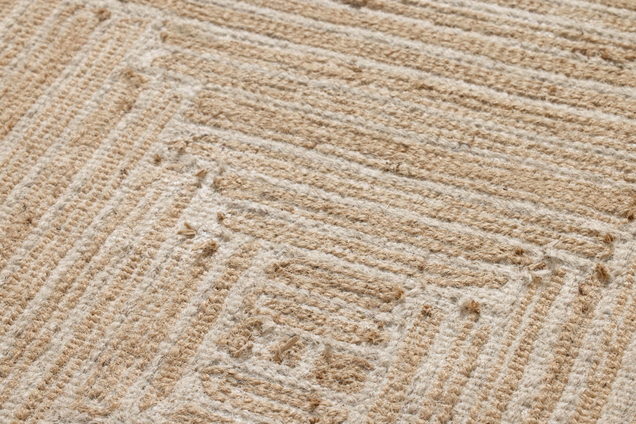 Style Quad Beige / Gold Rug Art shown from a different angle to reveal its pattern.