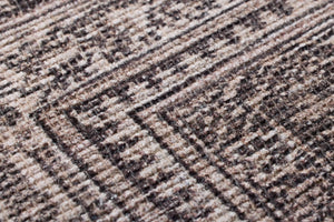 Cyrene Brown / Beige Rug Art shown from a different angle to reveal its pattern.