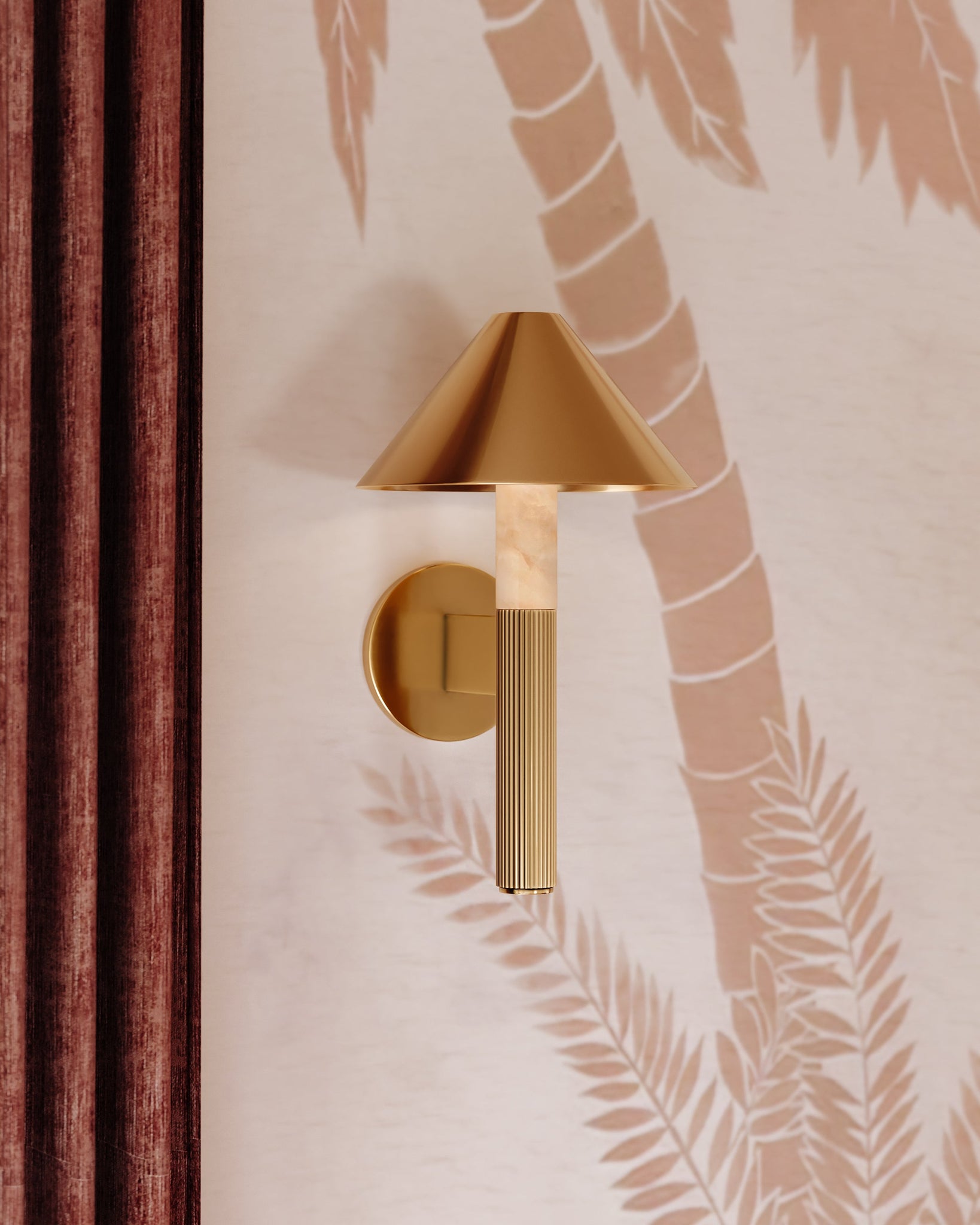 Altona Wall Sconce styled in a warmly lit hallway for warm, layered light at Laurie Yapp Home.