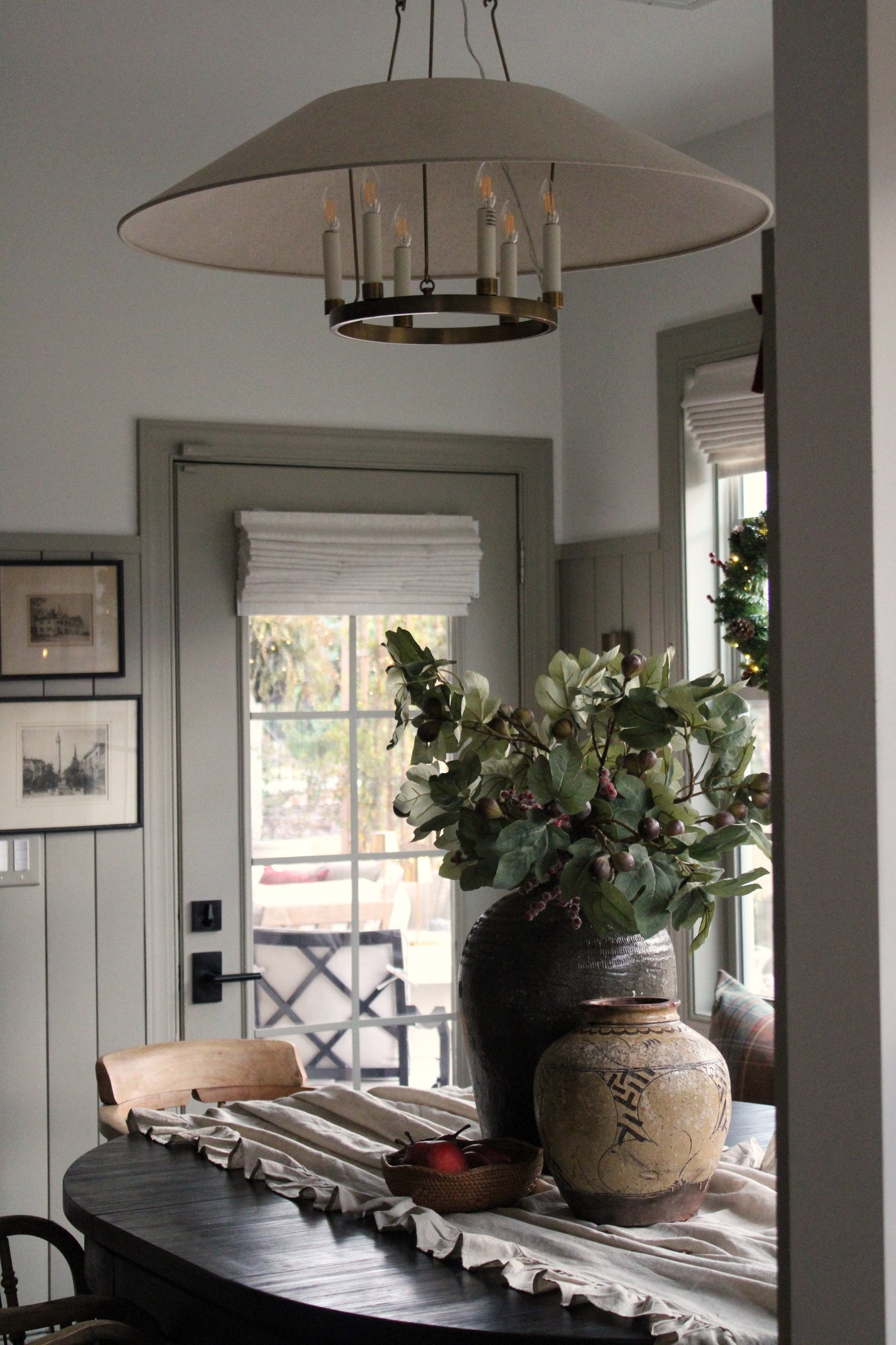 Archive Chandelier 38" styled in an elegant dining room for warm, layered light at Laurie Yapp Home.