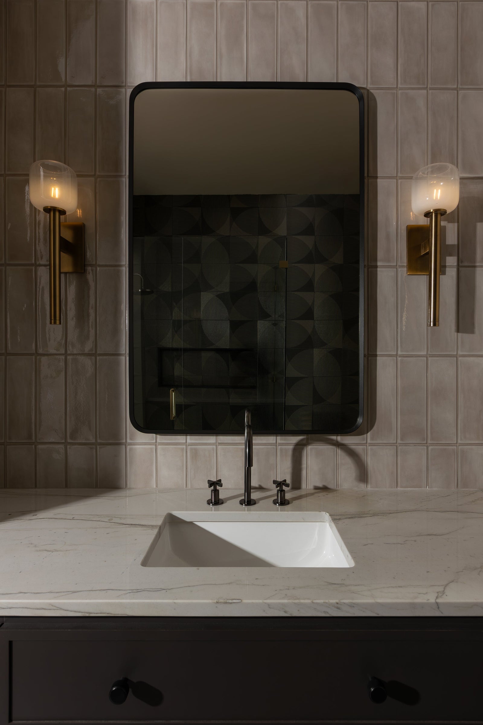 Axton Wall Sconce styled in a curated living room for warm, layered light at Laurie Yapp Home.