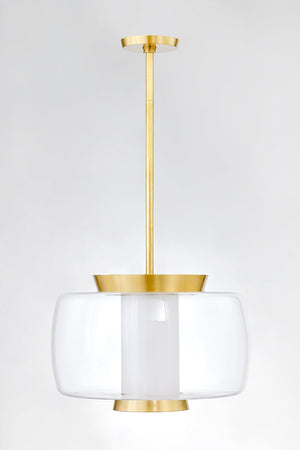 Beau Pendant 20" in aged brass shown from a second angle to highlight the shade shape and metal detail.