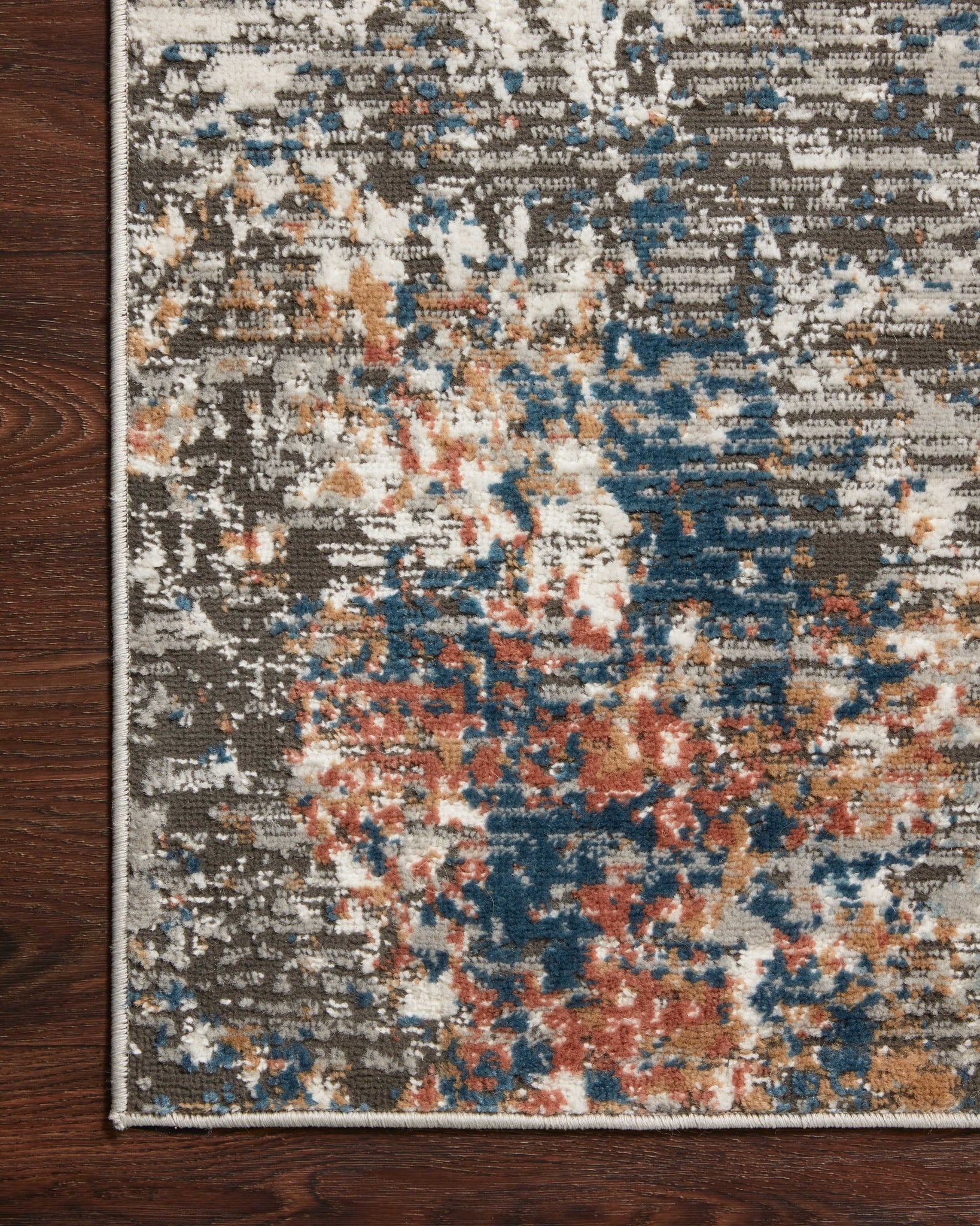 Bianca Granite / Multi styled in a living room at Laurie Yapp Home.