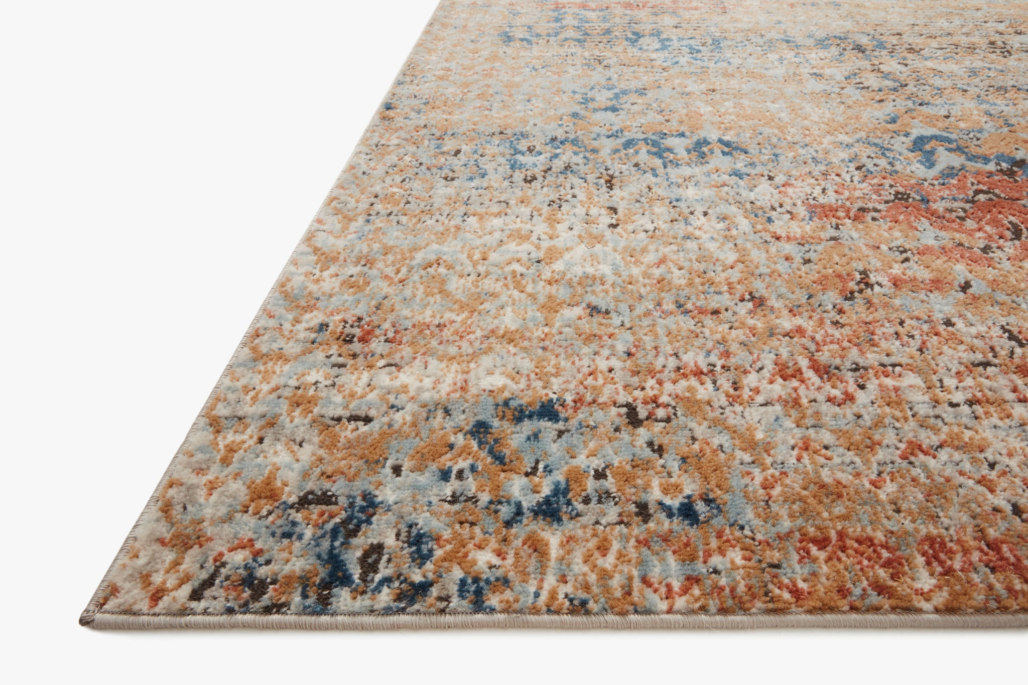 Side view of the Bianca Ocean / Spice rug.