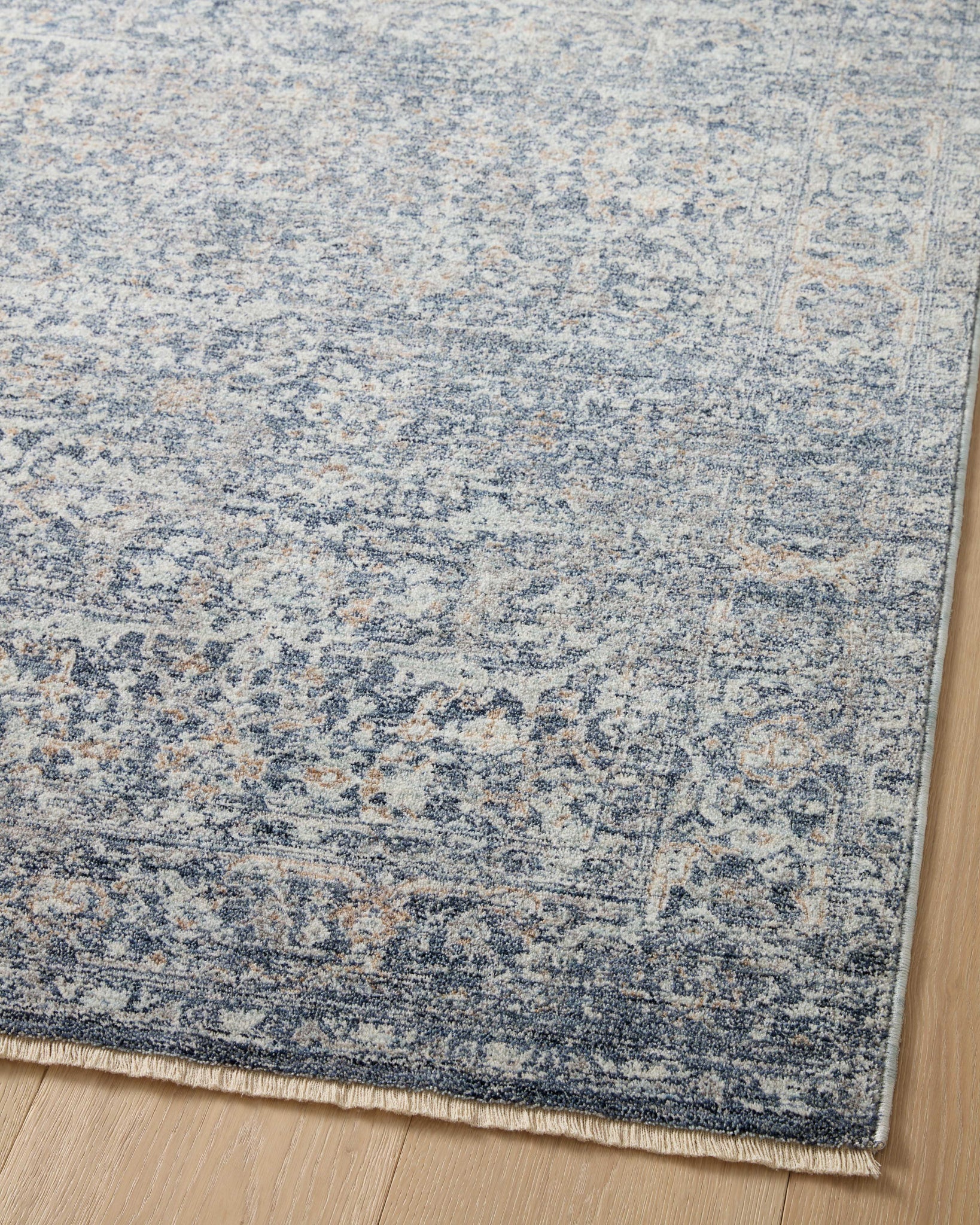 Blake Denim / Taupe shown from a different angle to reveal its pattern.