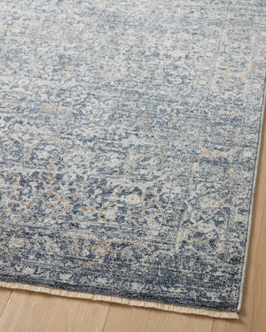 Blake Denim / Taupe shown from a different angle to reveal its pattern.