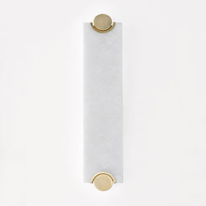 Brant Wall Sconce in aged brass shown from a second angle to highlight the arm curve and shade silhouette.