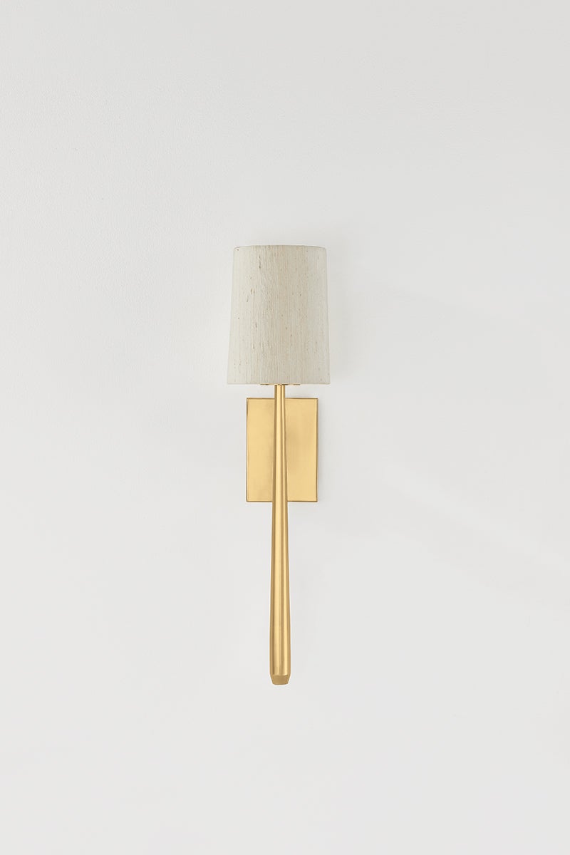 Bridgeton Wall Sconce in aged brass shown from a second angle to highlight the arm curve and shade silhouette.
