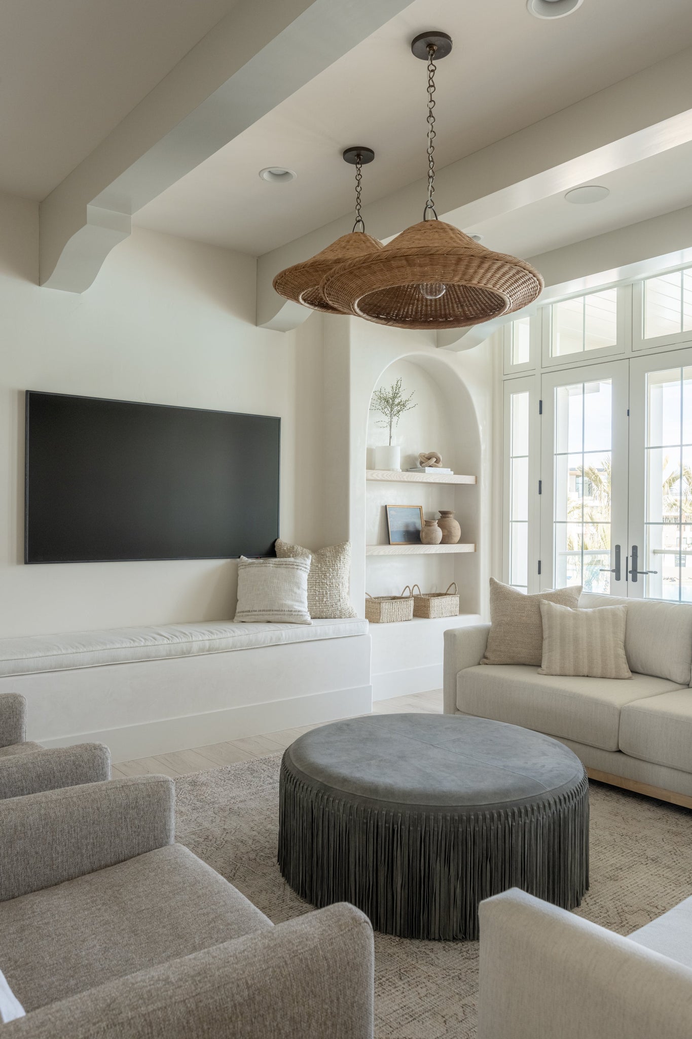 Baychester Pendant 32" styled in a welcoming entryway for warm, layered light at Laurie Yapp Home.