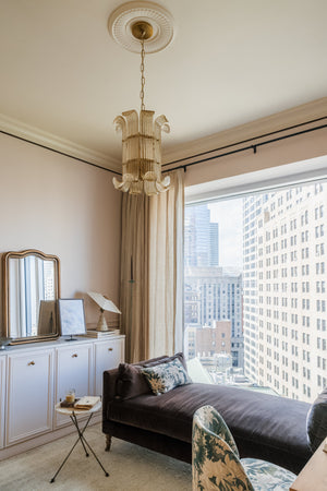 Brasher Pendant in aged brass styled in a welcoming entryway for warm, layered light at Laurie Yapp Home.