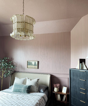 Brasher Chandelier in aged brass styled in a two-story entry for warm, layered light at Laurie Yapp Home.