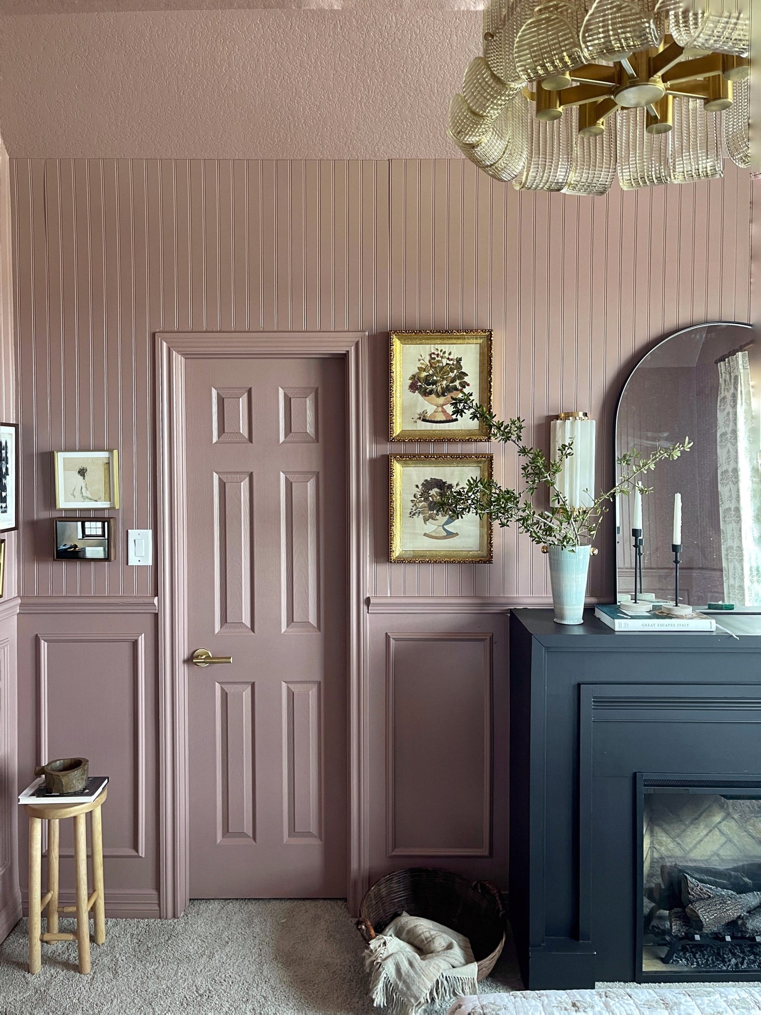 Hillside Wall Sconce 6" x 13.5" in aged brass styled in a curated living room for warm, layered light at Laurie Yapp Home.