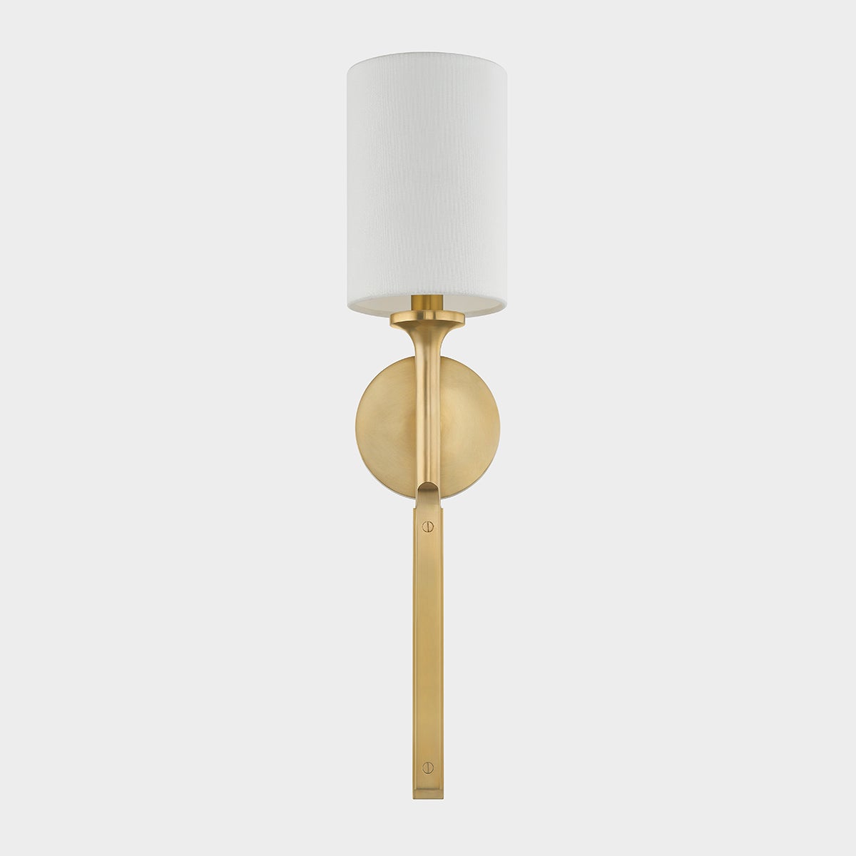 Close-up of the Brewster Wall Sconce in aged brass showing the arm curve and shade silhouette.